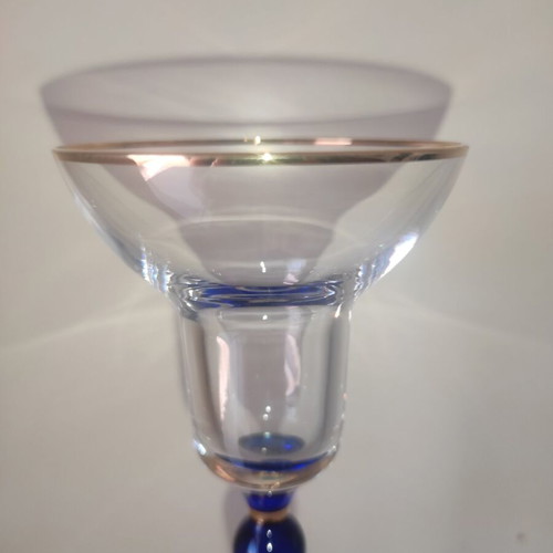 Glass candlestick like new with gilded details