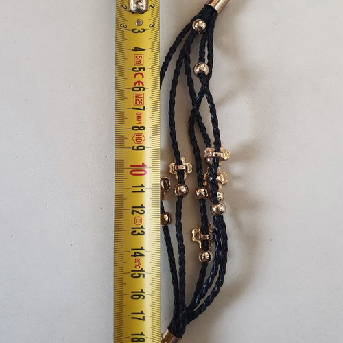 Black braided bracelet with gold beads and crystal clover like new