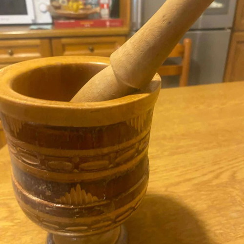 Wooden mortar and pestle used, old