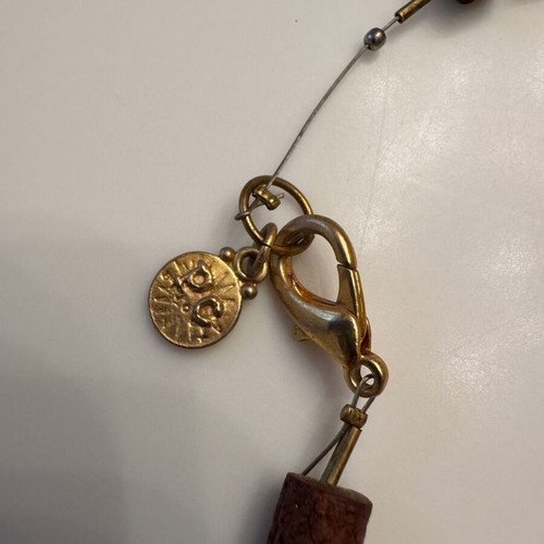 Women's long necklace with lava beads and gold stone like new