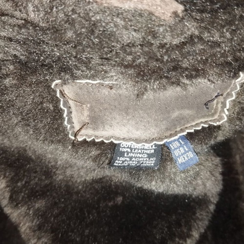 Brown half coat with fur used, synthetic
