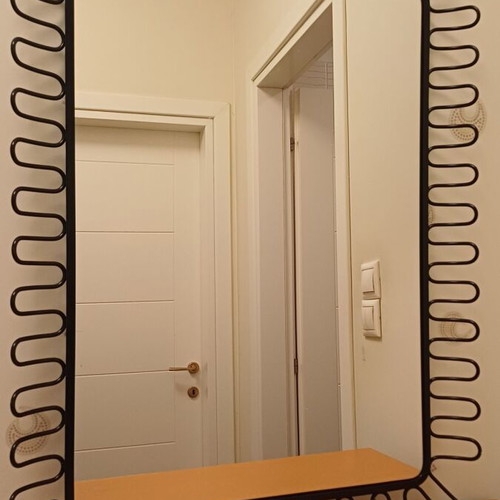 IKEA Mandal mirror like new with wavy metal frame