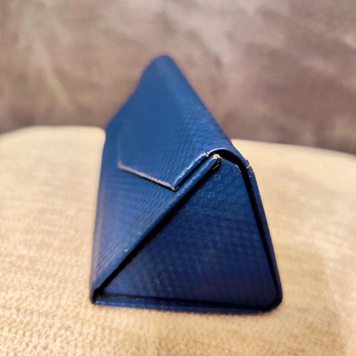 Blue leather glasses case used with magnetic clasp