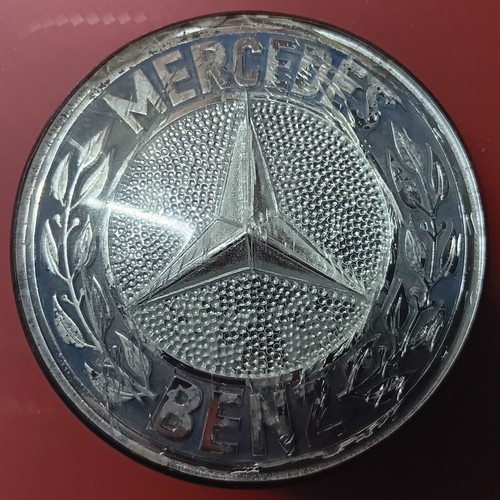 Collectible plastic Mercedes truck emblem used