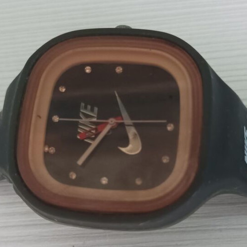 Nike wristwatch used, black and brown