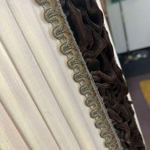 Vintage floor lamp used with ornate metal base and pleated fabric shade