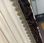 Vintage floor lamp used with ornate metal base and pleated fabric shade