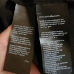 Calvin Klein dress black with back opening like new, size L