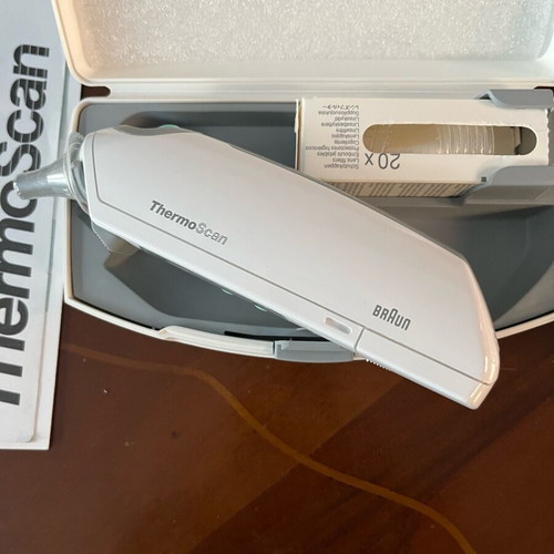 Brown electronic ear thermometer new with two sets of covers