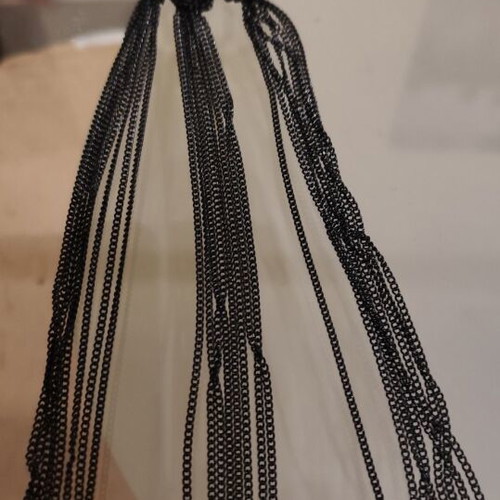 Long gold necklace with black chains new, heavy piece