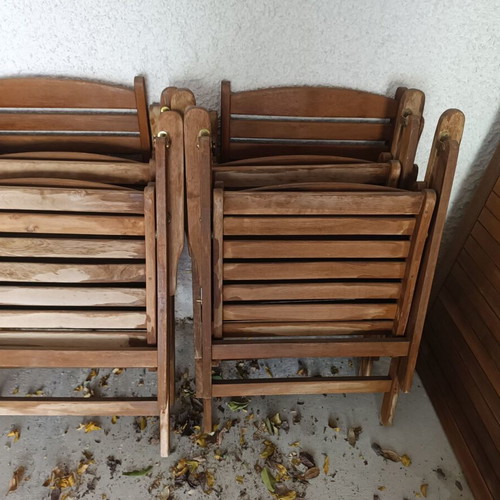 Wooden garden table with 4 armchairs, 2 recliners and beige cushions used