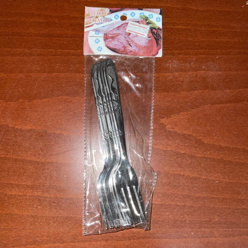 Set of stainless steel forks with decorative handle