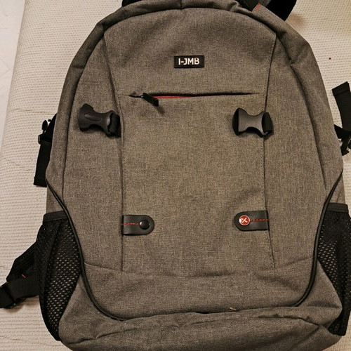 Backpack with laptop compartment new in gray color