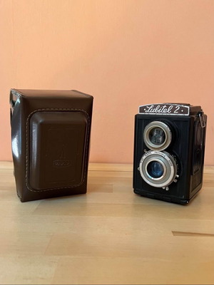 Lubitel 2 camera used with leather case