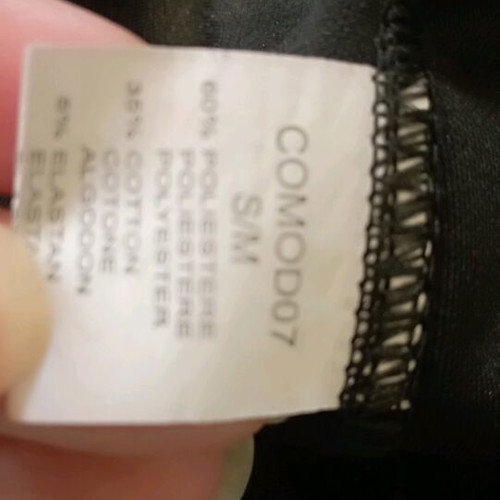 Black pants like new with buttons at the hem
