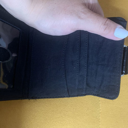 Guess wallet used, black canvas with faux croc details