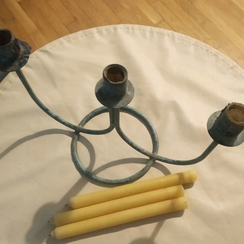 Vintage three-arm candlestick made of patinated brass like new