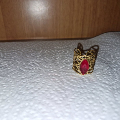 Fwo ring gold color with red stone and adjustable size like new