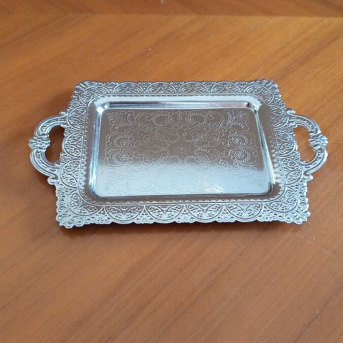 Vintage decorative tray with embossed designs, silver color