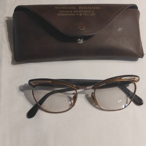 Vintage eyeglasses used, gold color with old case