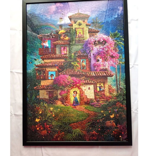 Encanto framed puzzle like new, 50x70cm wall decoration
