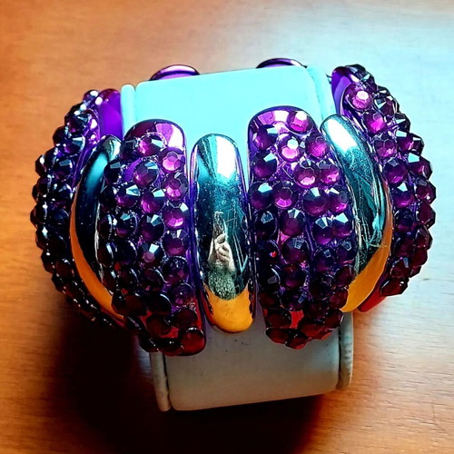 Bracelet with purple rhinestones and silver elements like new
