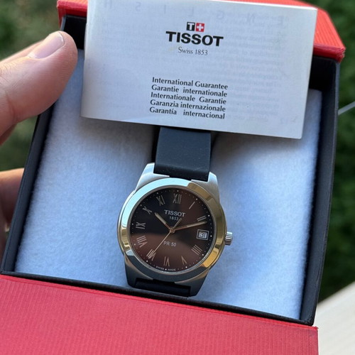 Tissot PR 50 stainless steel watch like new with sapphire and date