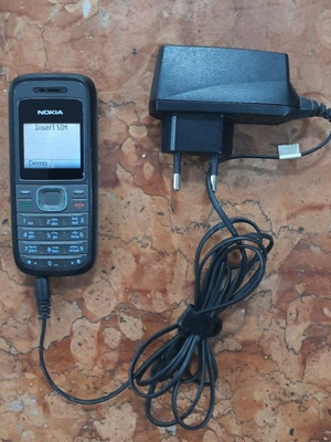 Nokia 1208 4MB gray with charger like new