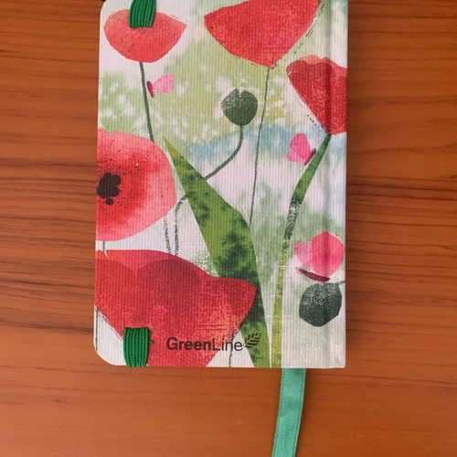 Floral notebook like new with pen, elastic band and bookmark