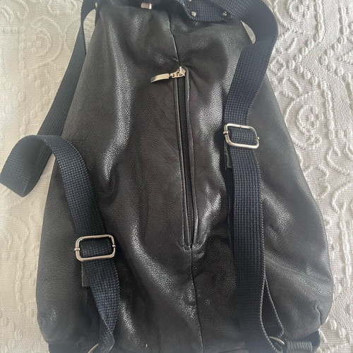 Leather backpack used with inner lining and fabric straps