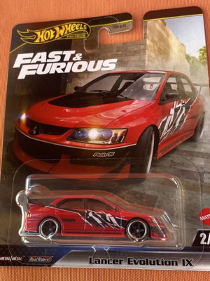 Hot Wheels Mitsubishi Lancer Evolution IX toy car