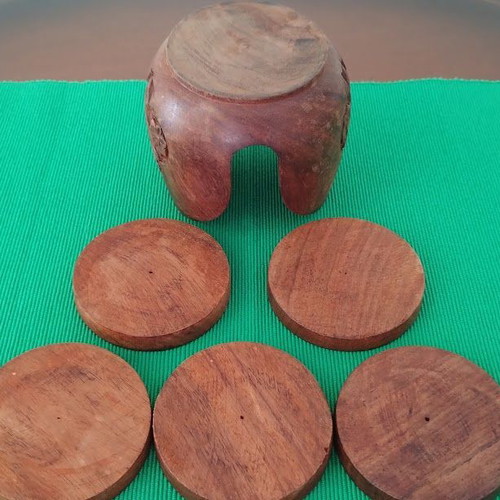 Handmade wooden coasters like new, set of six with carved floral designs