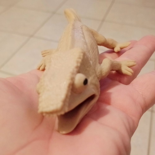 Rubber toys set of 4 used, chameleons and reptiles