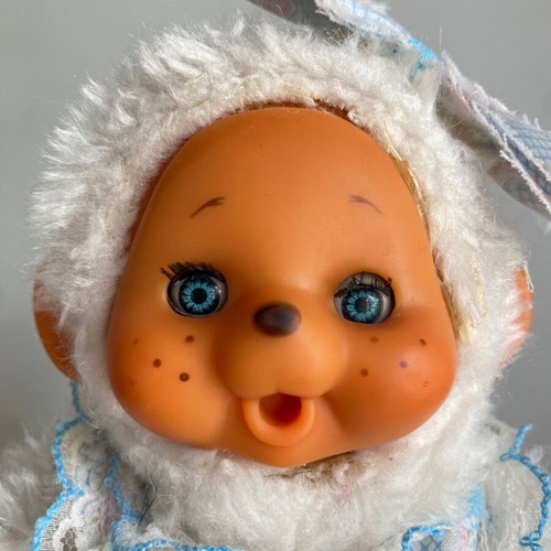 El Greco vintage white monkey plush toy in dress