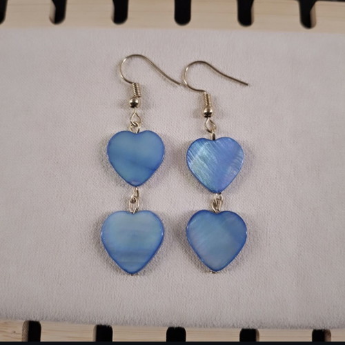 Earrings with dangling blue hearts like new