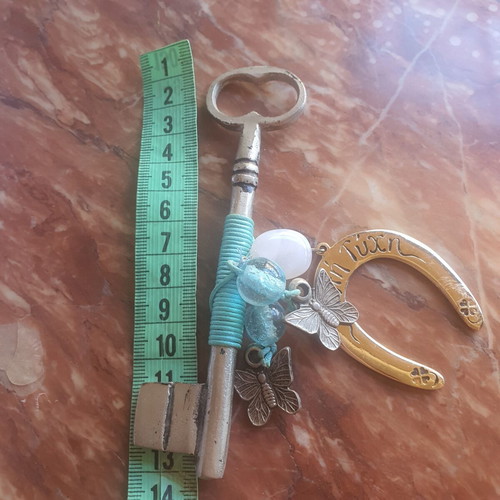 Lucky key charm with horseshoe