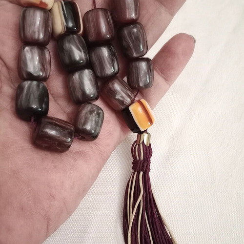 Worry beads with synthetic resin beads in purple color like new