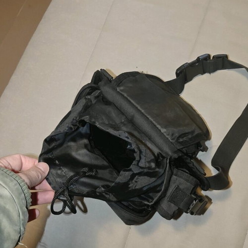 Thigh bag used with multiple compartments and phone pocket