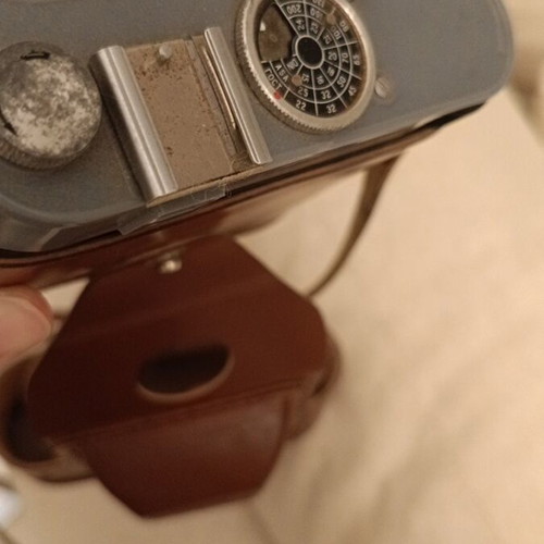 Cosmic 35 camera used, non-functional with leather case