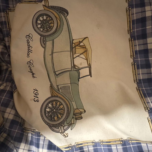 Large floor pouf used with vintage car design