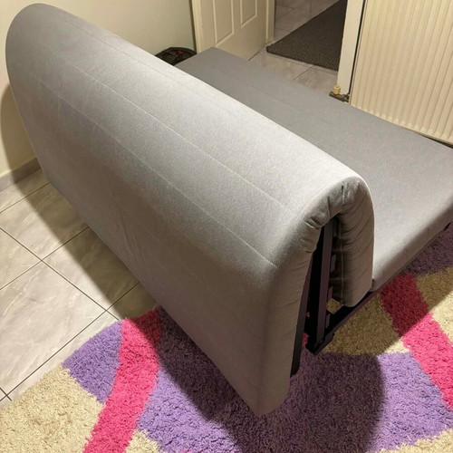 IKEA Lycksele Lövås Sofa Bed like new, fuchsia cover included