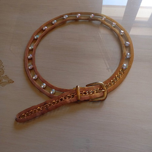 Adjustable metal belt like new with rhinestones gold color