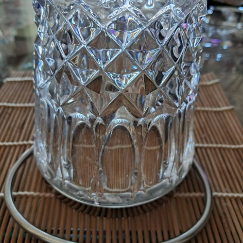 Vintage crystal ice bucket used with stainless steel rim and handle