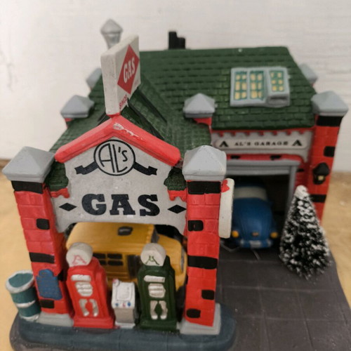 Decorative gas station like new with vehicles