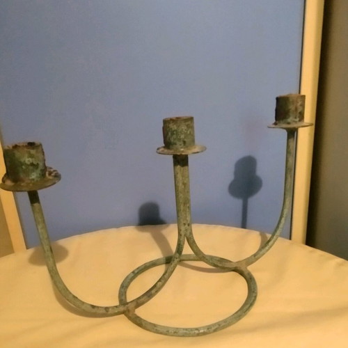 Vintage three-arm candlestick made of patinated brass like new