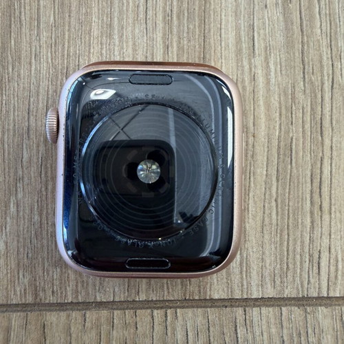 Apple Watch Series SE 44mm used, rose gold with new white strap