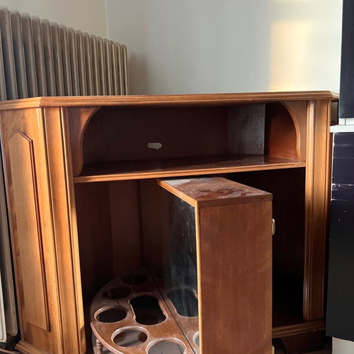 Vintage wooden corner TV cabinet used with hidden bar