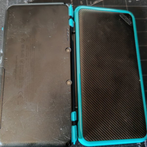 Nintendo 2DS XL like new with stylus, charger, and 4GB SD card