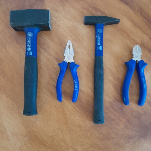 Lux tools used tools set with hammer, pliers, side cutter