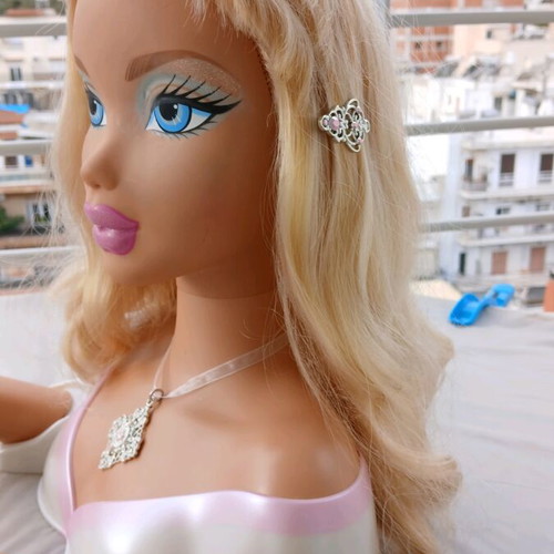 Doll head styling set with hairdressing accessories used